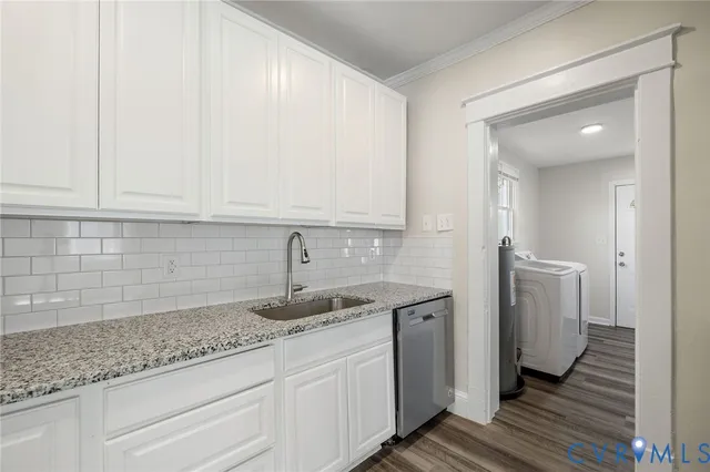 a kitchen with appliances and cabinets