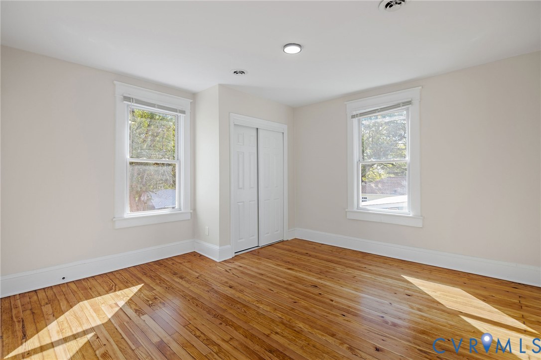 623 Colonial Avenue Colonial Heights, VA 23834 - Photo 32 of 44 a view of an empty room with wooden floor and a window