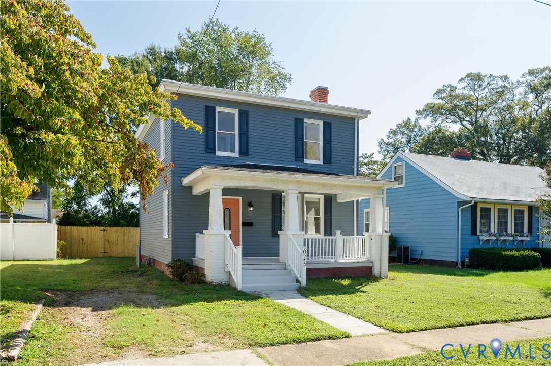 623 Colonial Avenue Colonial Heights, VA 23834 - Photo 4 of 44 a front view of a house with a yard