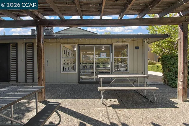 a view of a house with a patio