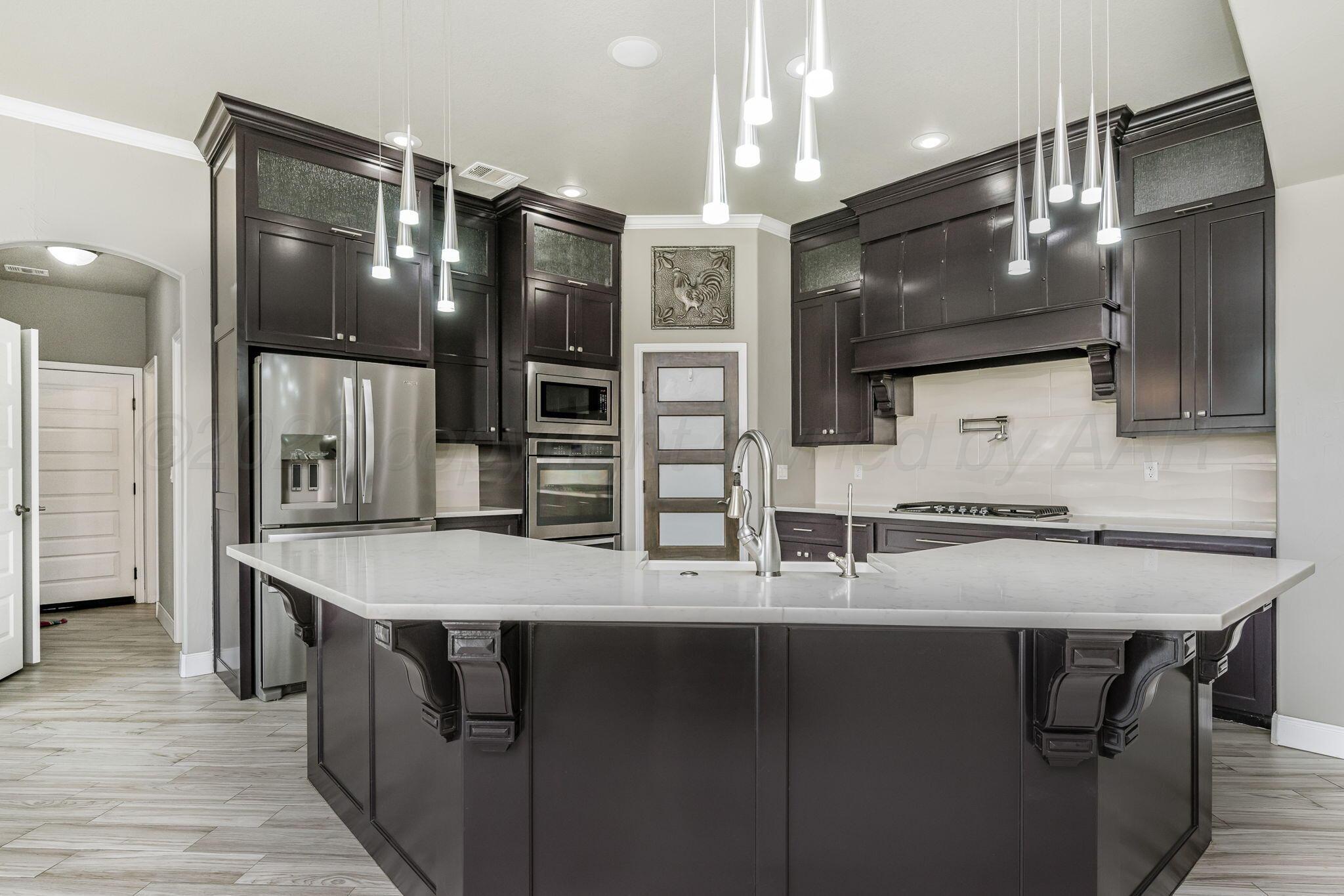 15351 Let It Be Amarillo, TX 79119 - Photo 7 of 47 Kitchen/Island