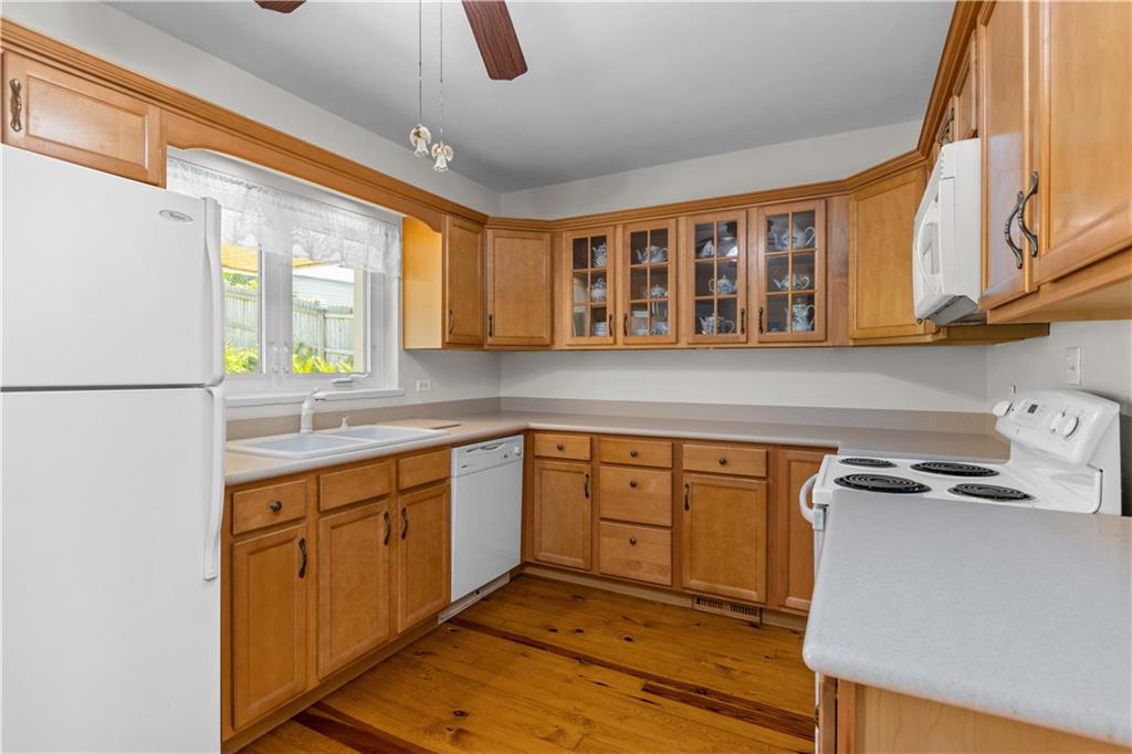 1580 Brush Run Road Washington, PA 15301 - Photo 17 of 27 a kitchen with stainless steel appliances granite countertop a sink and a refrigerator