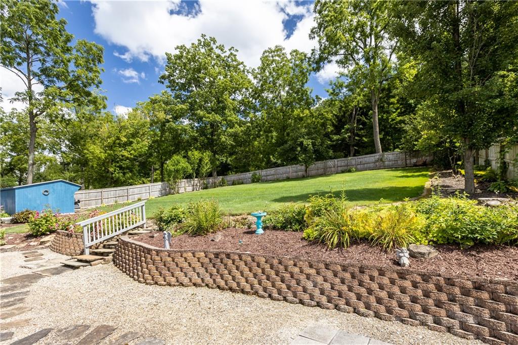 1580 Brush Run Road Washington, PA 15301 - Photo 2 of 27 a view of a garden with an outdoor space