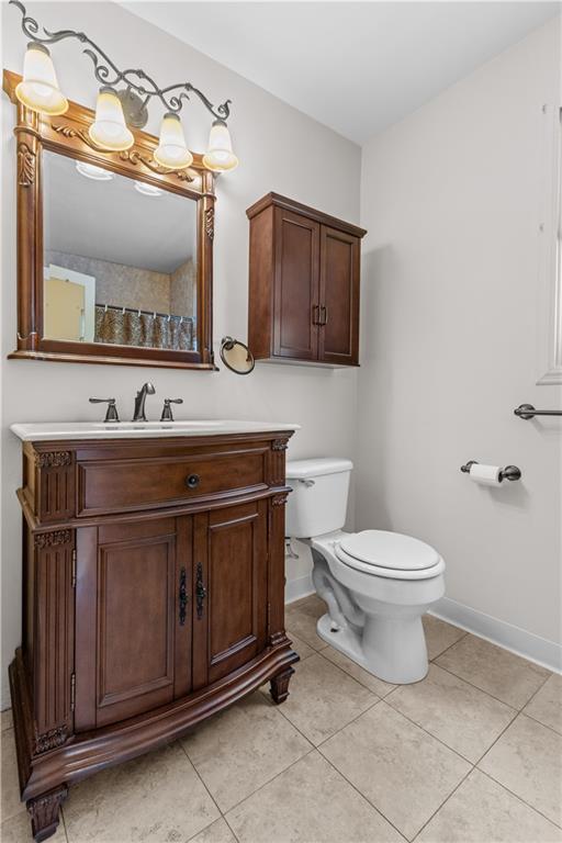 1580 Brush Run Road Washington, PA 15301 - Photo 25 of 27 a bathroom with a toilet a sink and mirror
