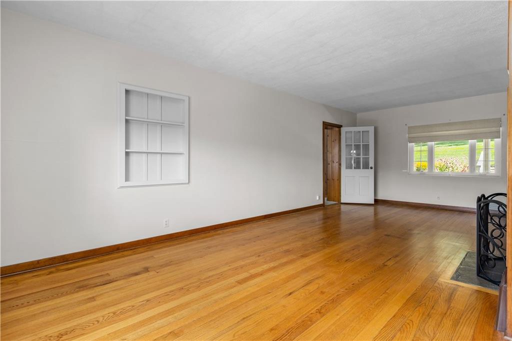 1580 Brush Run Road Washington, PA 15301 - Photo 8 of 27 wooden floor in an empty room with a window