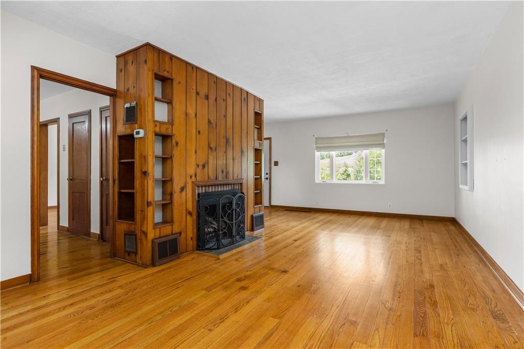 1580 Brush Run Road Washington, PA 15301 - Photo 10 of 27 an empty room with wooden floor and windows