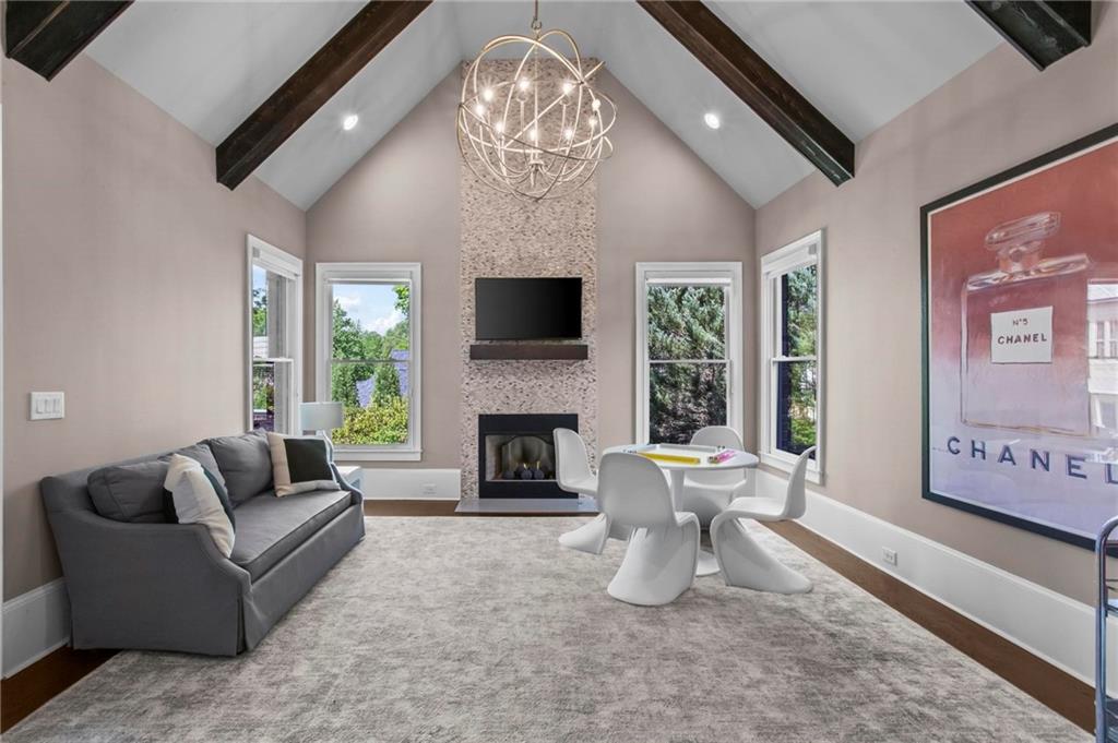 490 Belada Boulevard Atlanta, GA 30342 - Photo 16 of 42 a living room with furniture and a fireplace