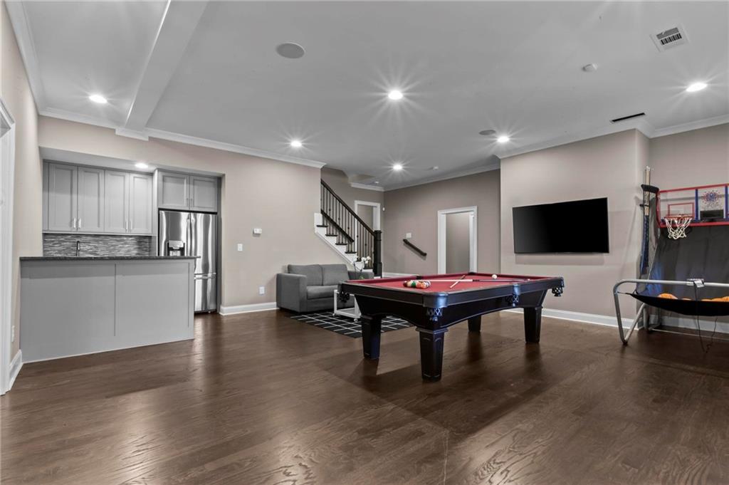 490 Belada Boulevard Atlanta, GA 30342 - Photo 31 of 42 a room with furniture pool table tennis pool and flat screen tv