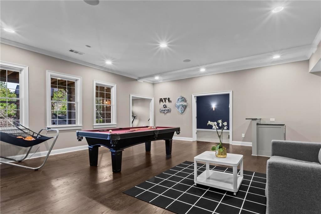 490 Belada Boulevard Atlanta, GA 30342 - Photo 32 of 42 a living room with furniture a large window and work place