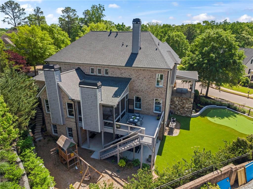 490 Belada Boulevard Atlanta, GA 30342 - Photo 38 of 42 an aerial view of a house with swimming pool garden and patio