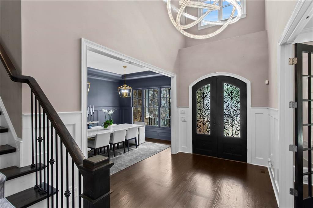 490 Belada Boulevard Atlanta, GA 30342 - Photo 4 of 42 a view of an entryway with wooden floor