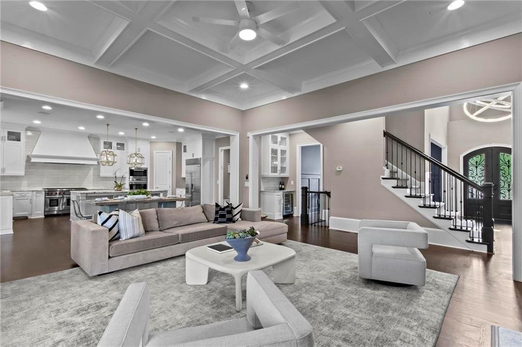 490 Belada Boulevard Atlanta, GA 30342 - Photo 10 of 42 a living room with furniture and wooden floor