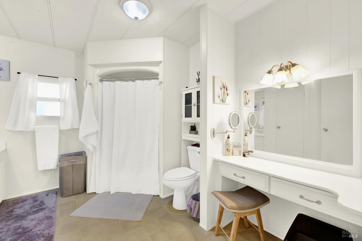 199 Lemon Tree Circle Vacaville, CA 95687 - Photo 25 of 56 Vanity area and shower in Primary Bathroom