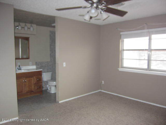 6215 Rutgers Street Amarillo, TX 79109 - Photo 5 of 11 master bedroom