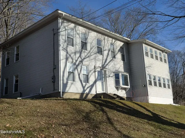 a house view with a backyard