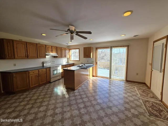 a large kitchen with cabinets