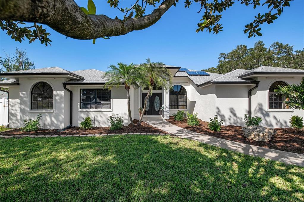 626 Cadiz Road Venice, FL 34285 - Photo 1 of 1 a front view of a house with a yard