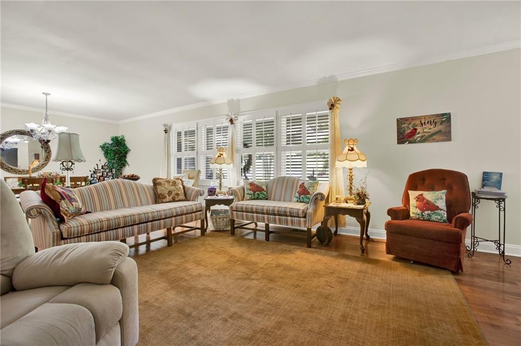 103 Mims Drive Calhoun, GA 30701 - Photo 13 of 34 a living room with furniture and a potted plant