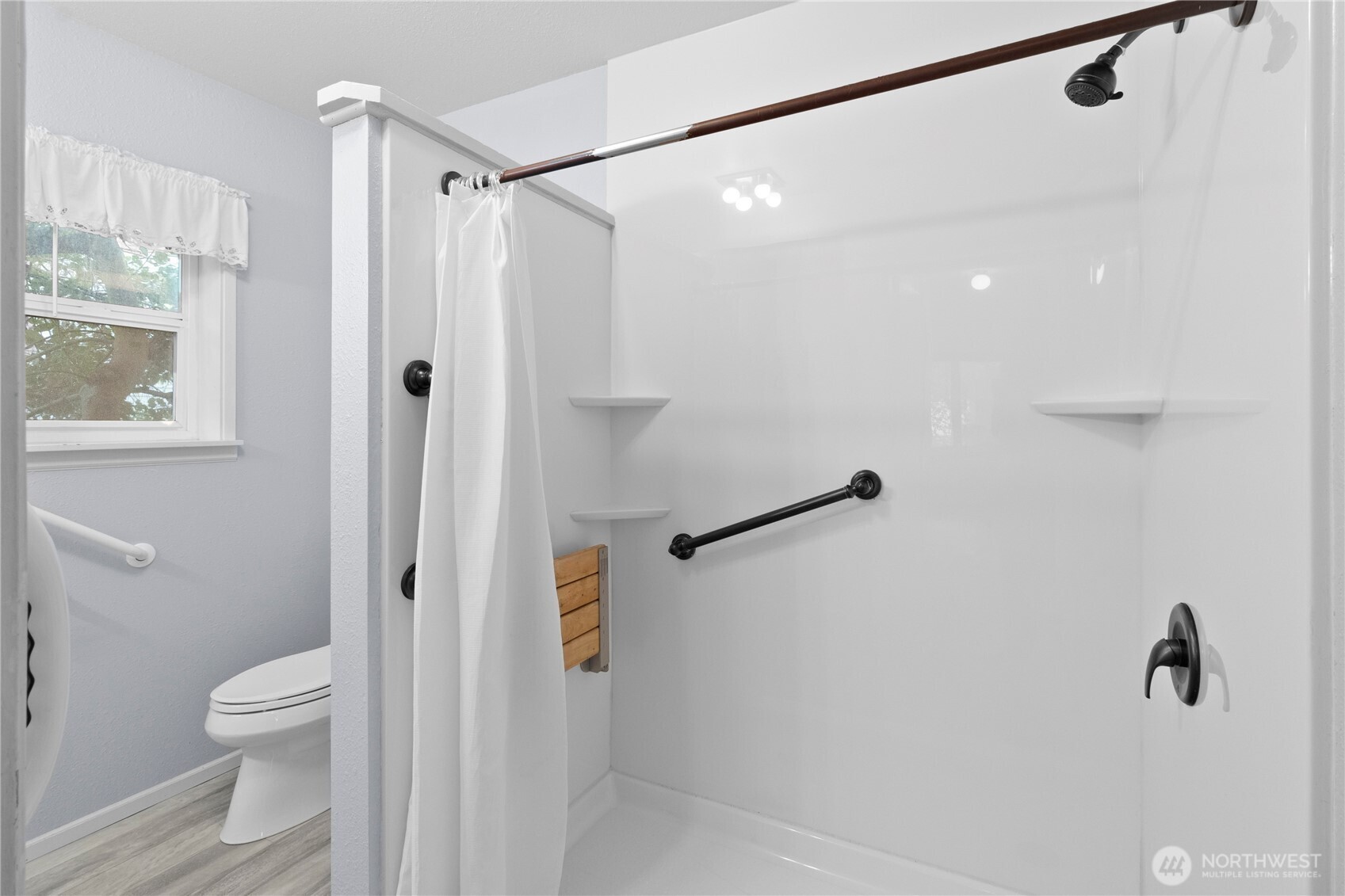 2431 Franklin Street Bellingham, WA 98225 - Photo 14 of 26 a bathroom with a shower and a toilet