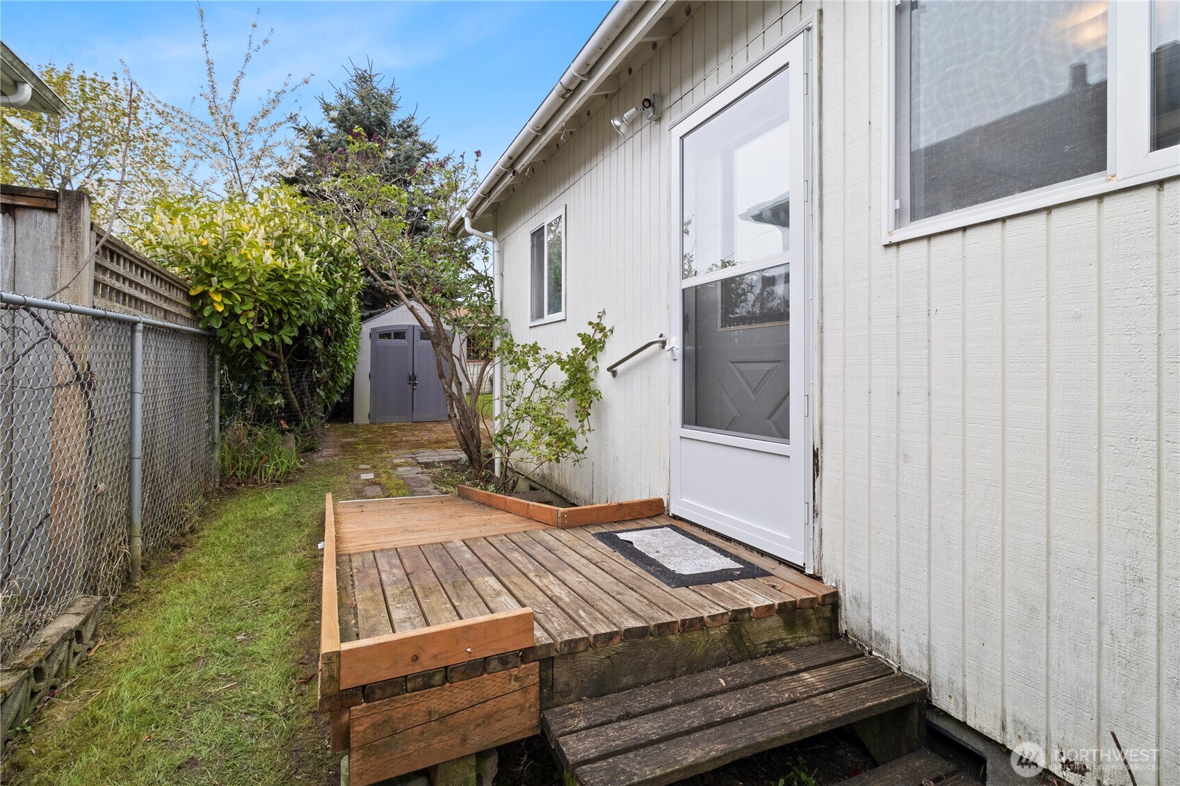 2431 Franklin Street Bellingham, WA 98225 - Photo 17 of 26 a view of a backyard with sitting area