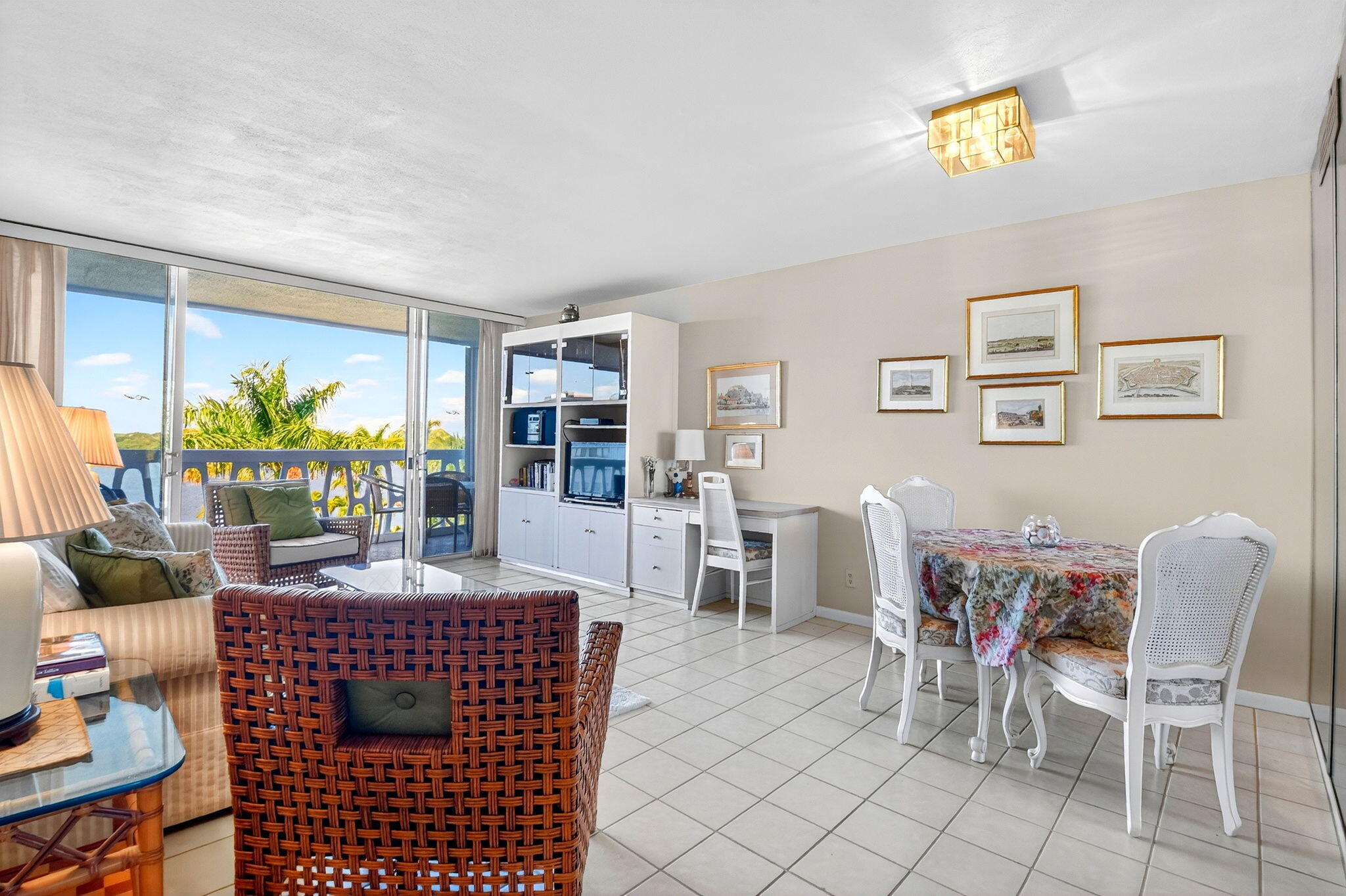 2505 South Ocean Boulevard, Unit 601 Palm Beach, FL 33480 - Photo 6 of 56 a dining room with furniture and a floor to ceiling window