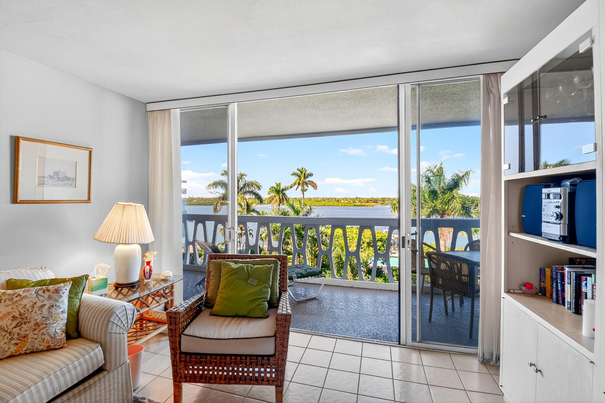 2505 South Ocean Boulevard, Unit 601 Palm Beach, FL 33480 - Photo 7 of 56 a living room with furniture and a lamp