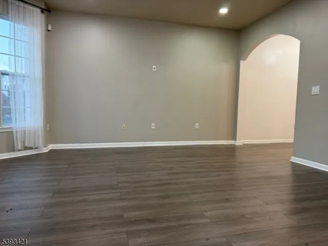 a view of a livingroom with wooden floor