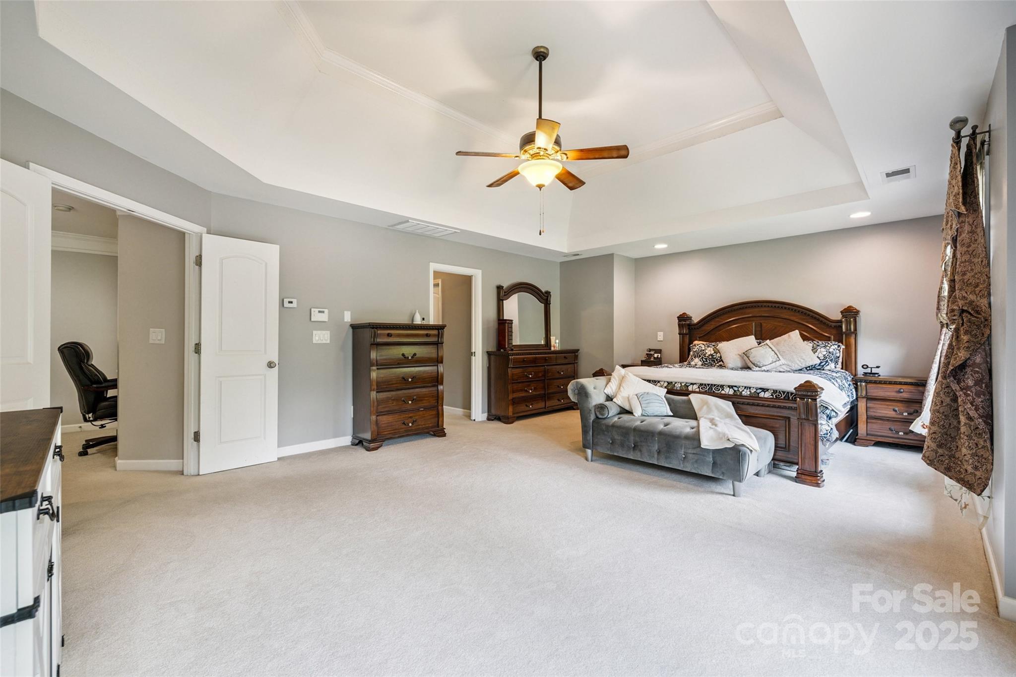 9142 Drayton Lane Indian Land, SC 29707 - Photo 23 of 48 a bedroom with furniture and a chandelier