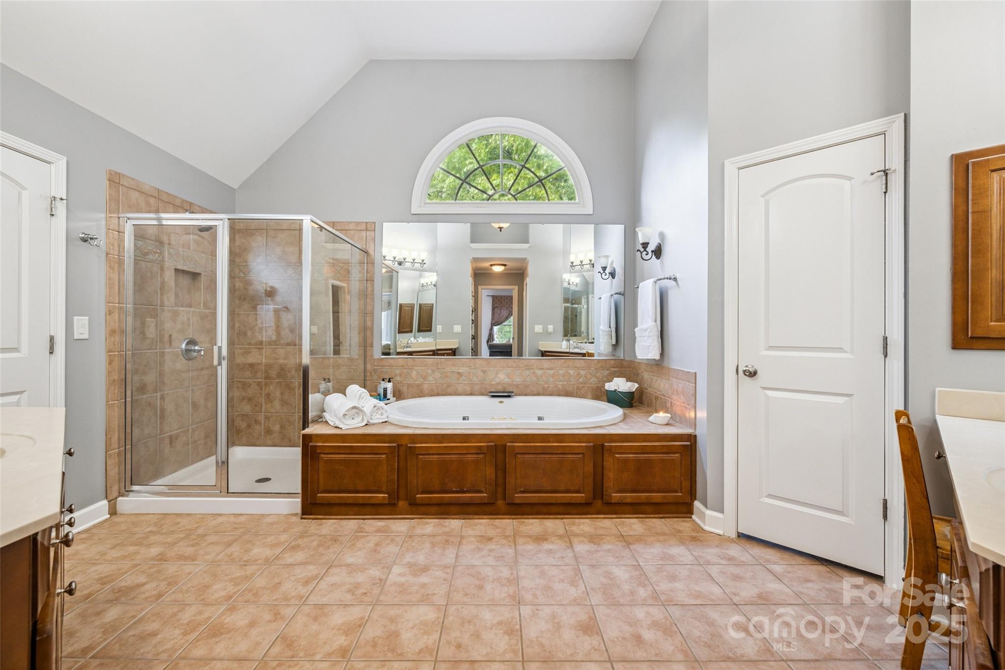9142 Drayton Lane Indian Land, SC 29707 - Photo 24 of 48 a bathroom with a tub and a large window