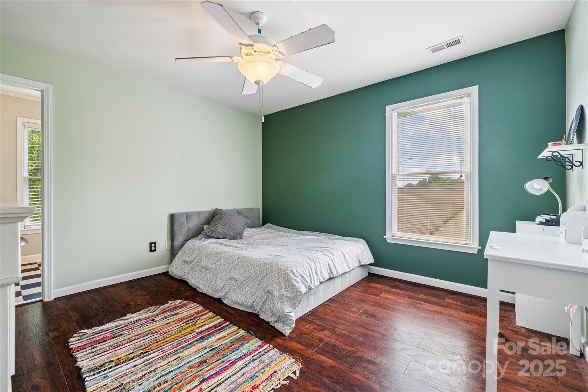 9142 Drayton Lane Indian Land, SC 29707 - Photo 32 of 48 a bedroom with a bed and a chandelier