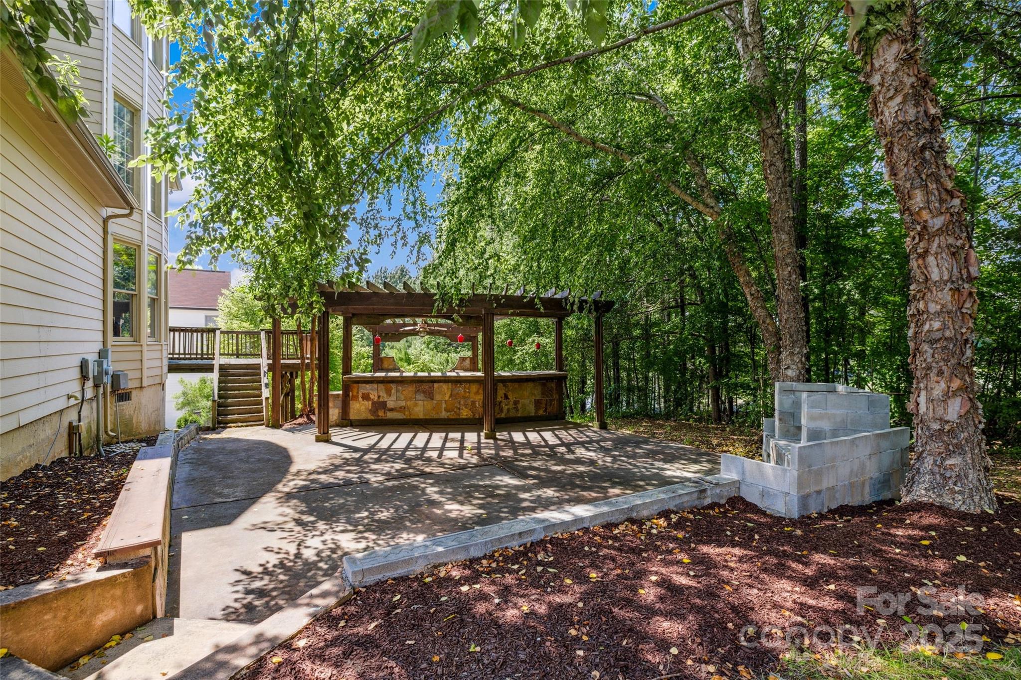 9142 Drayton Lane Indian Land, SC 29707 - Photo 42 of 48 a view of a backyard with large tree