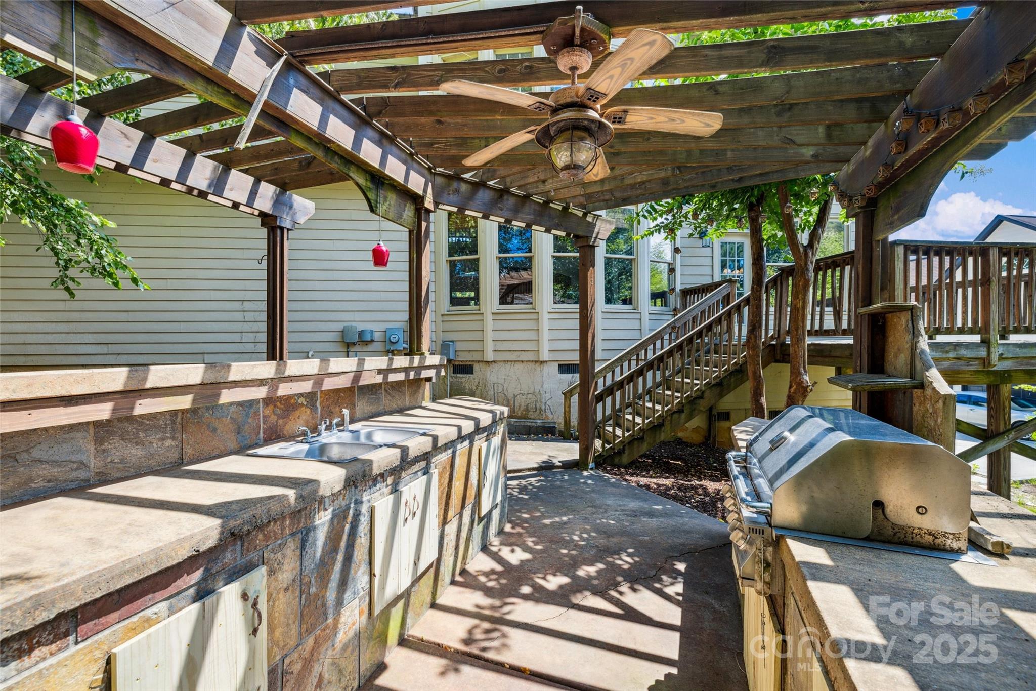 9142 Drayton Lane Indian Land, SC 29707 - Photo 45 of 48 a view of a deck with couches table and chairs