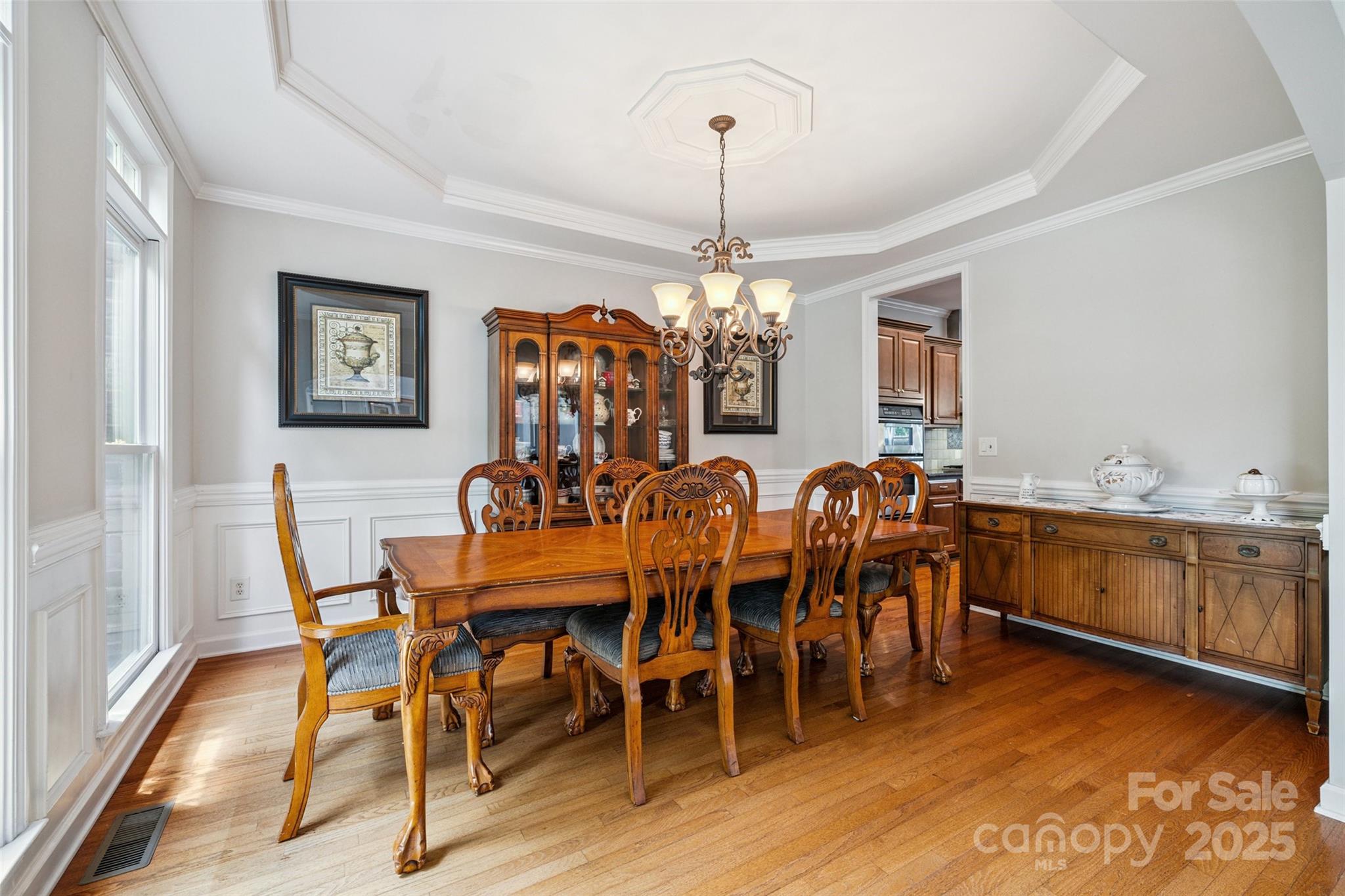 9142 Drayton Lane Indian Land, SC 29707 - Photo 5 of 48 a view of a dining room with furniture window and wooden floor
