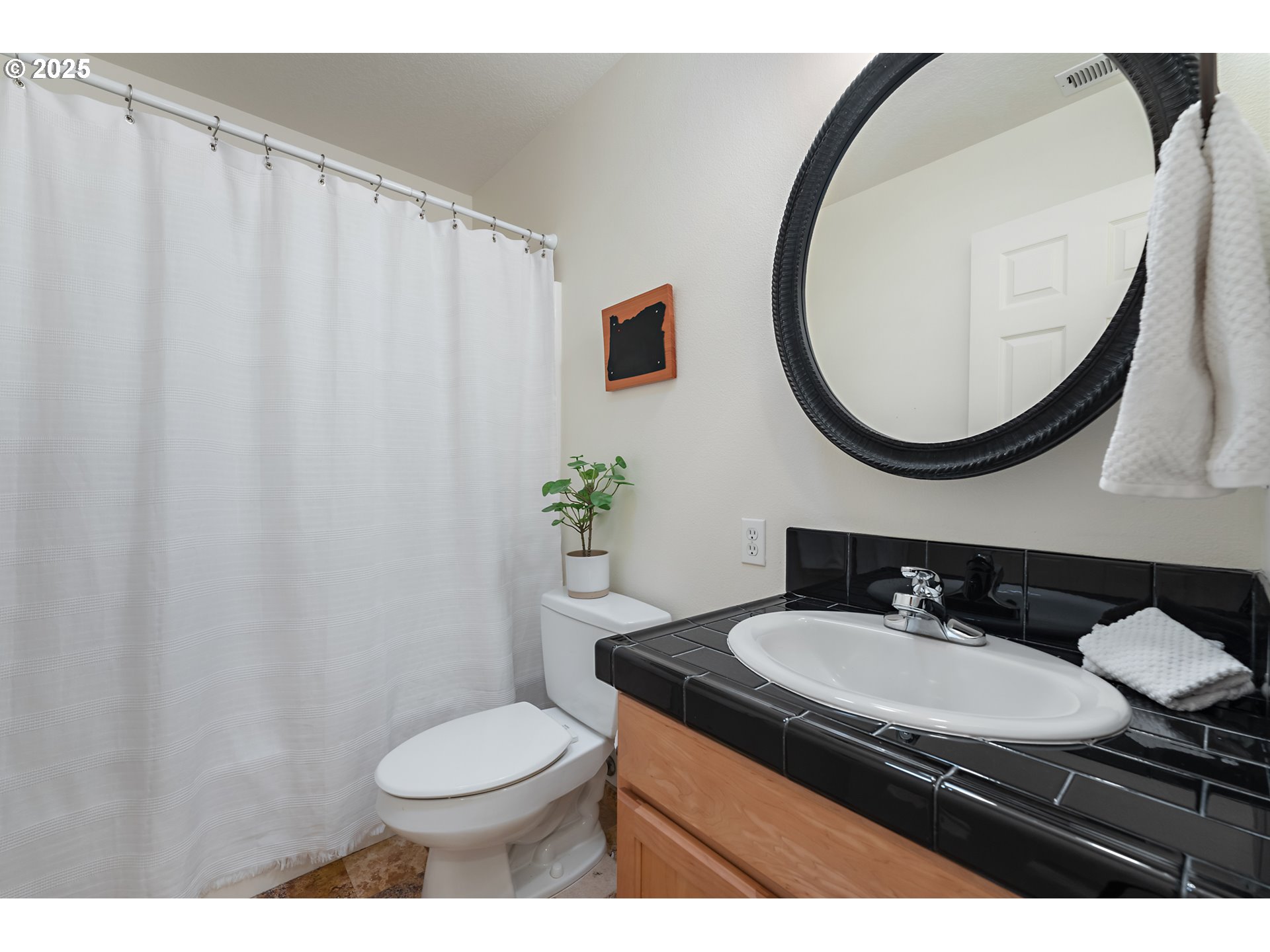 417 Harris Lane Oregon City, OR 97045 - Photo 15 of 21 a bathroom with a granite countertop sink and a mirror