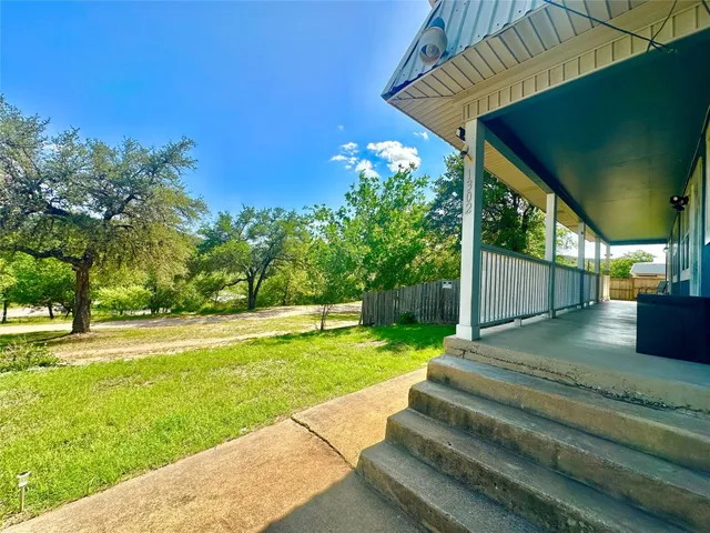 a view of a porch with furniture