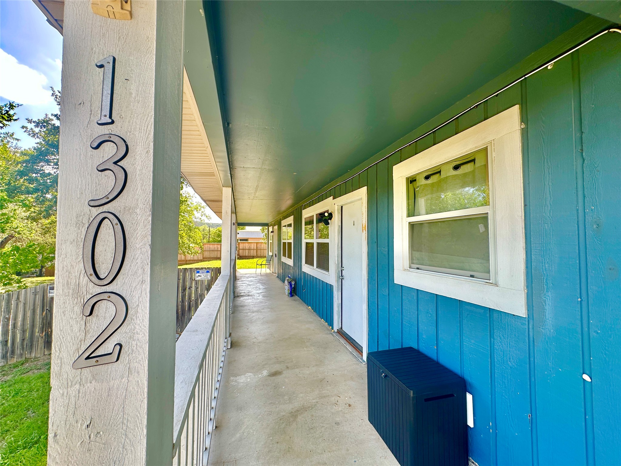1302 South Quinlan Park Road Austin, TX 78732 - Photo 6 of 40 a view of a porch with furniture