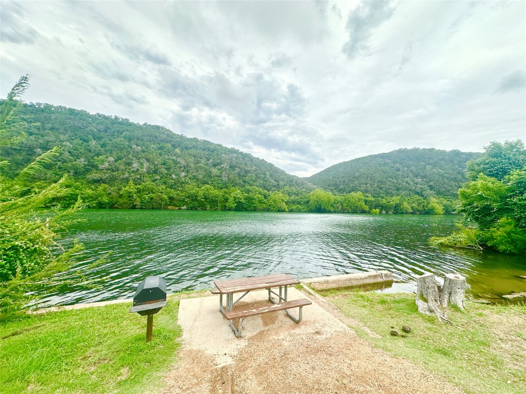 1302 South Quinlan Park Road Austin, TX 78732 - Photo 7 of 40 Mary Quinlan Park Water view with a heavily wooded area