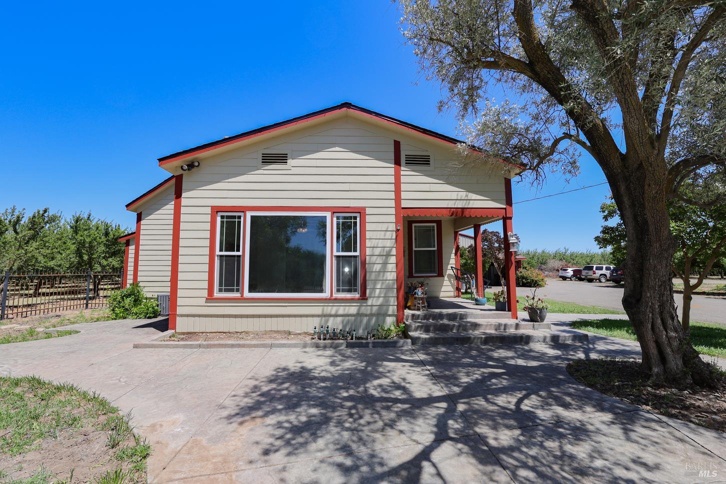 7948 North Meridian Road Dixon, CA 95620 - Photo 45 of 59 a front view of a house with garden