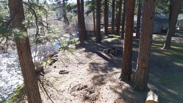 a backyard of a house with lots of green space