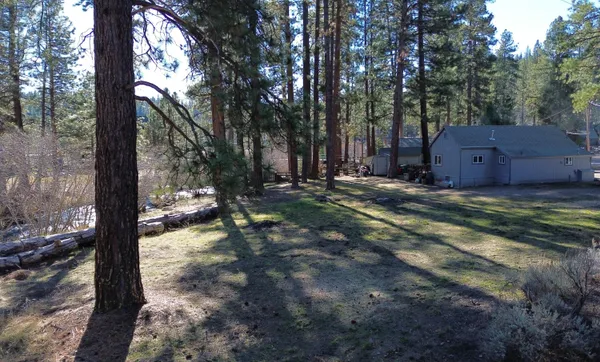 a backyard of a house with lots of green space