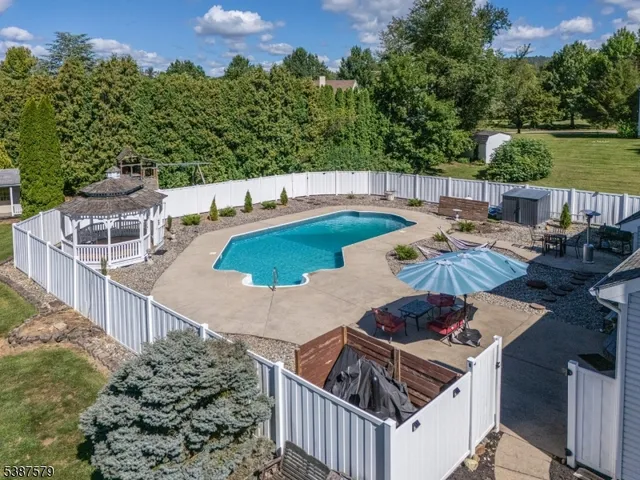 a view of a balcony with furniture