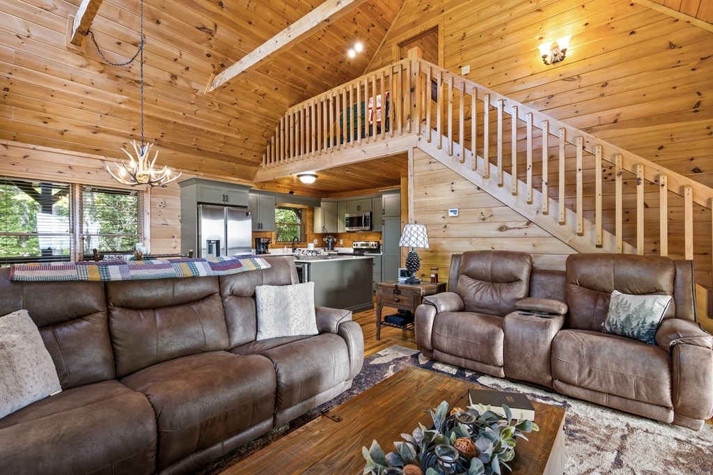 16 Enchanting Circle Morganton, GA 30560 - Photo 15 of 57 a living room with furniture ceiling fan and a rug
