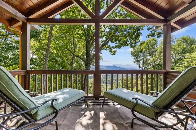 a kitchen with a sink and a large window