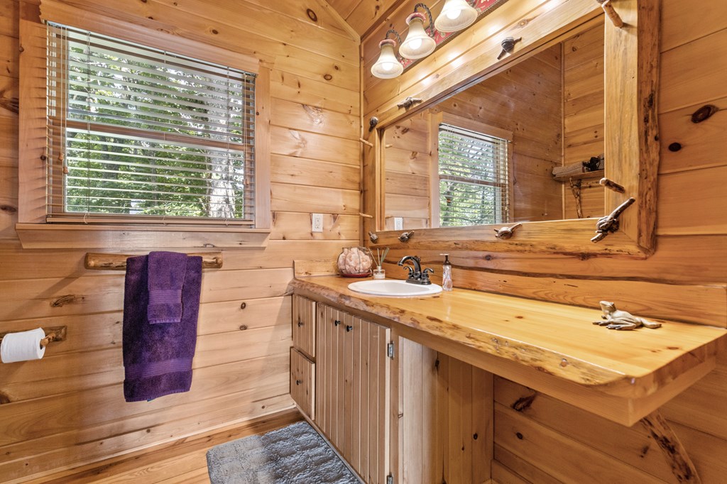 16 Enchanting Circle Morganton, GA 30560 - Photo 25 of 57 a kitchen with a sink and a large window