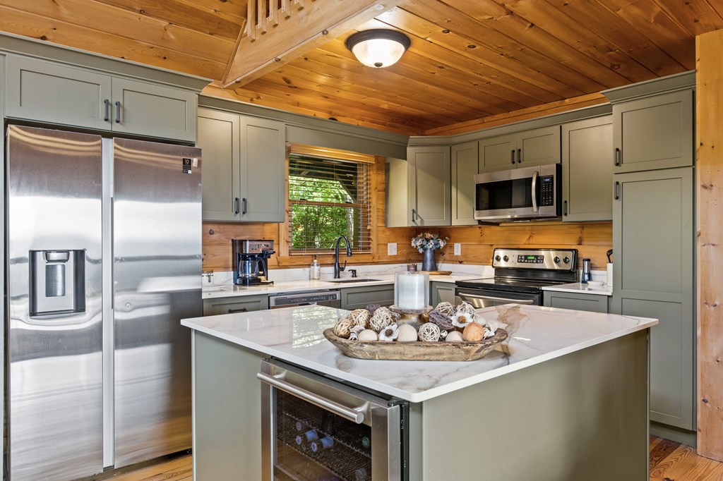 16 Enchanting Circle Morganton, GA 30560 - Photo 4 of 57 a kitchen with a sink appliances and cabinets