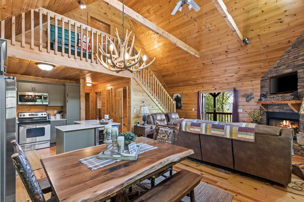 16 Enchanting Circle Morganton, GA 30560 - Photo 8 of 57 a view of a dining room with furniture window and wooden floor