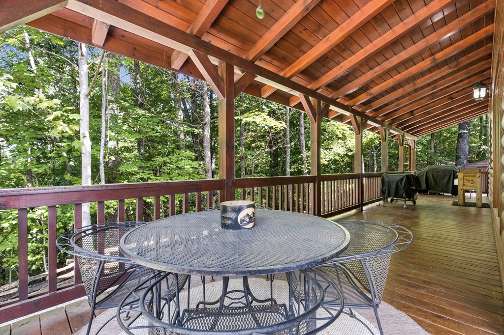 16 Enchanting Circle Morganton, GA 30560 - Photo 10 of 57 a view of a balcony with wooden floor