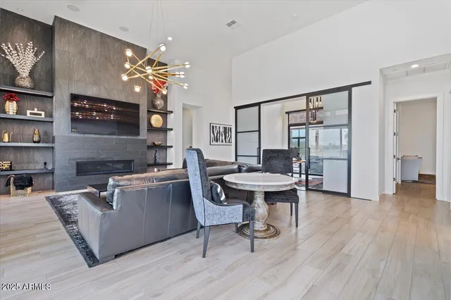a room with furniture and a potted plant