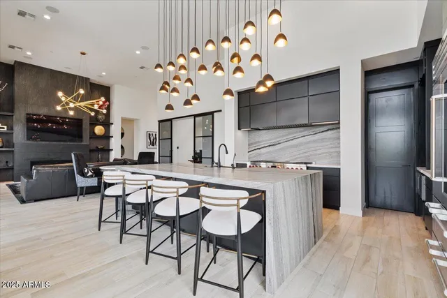 a bedroom with a bed and dresser