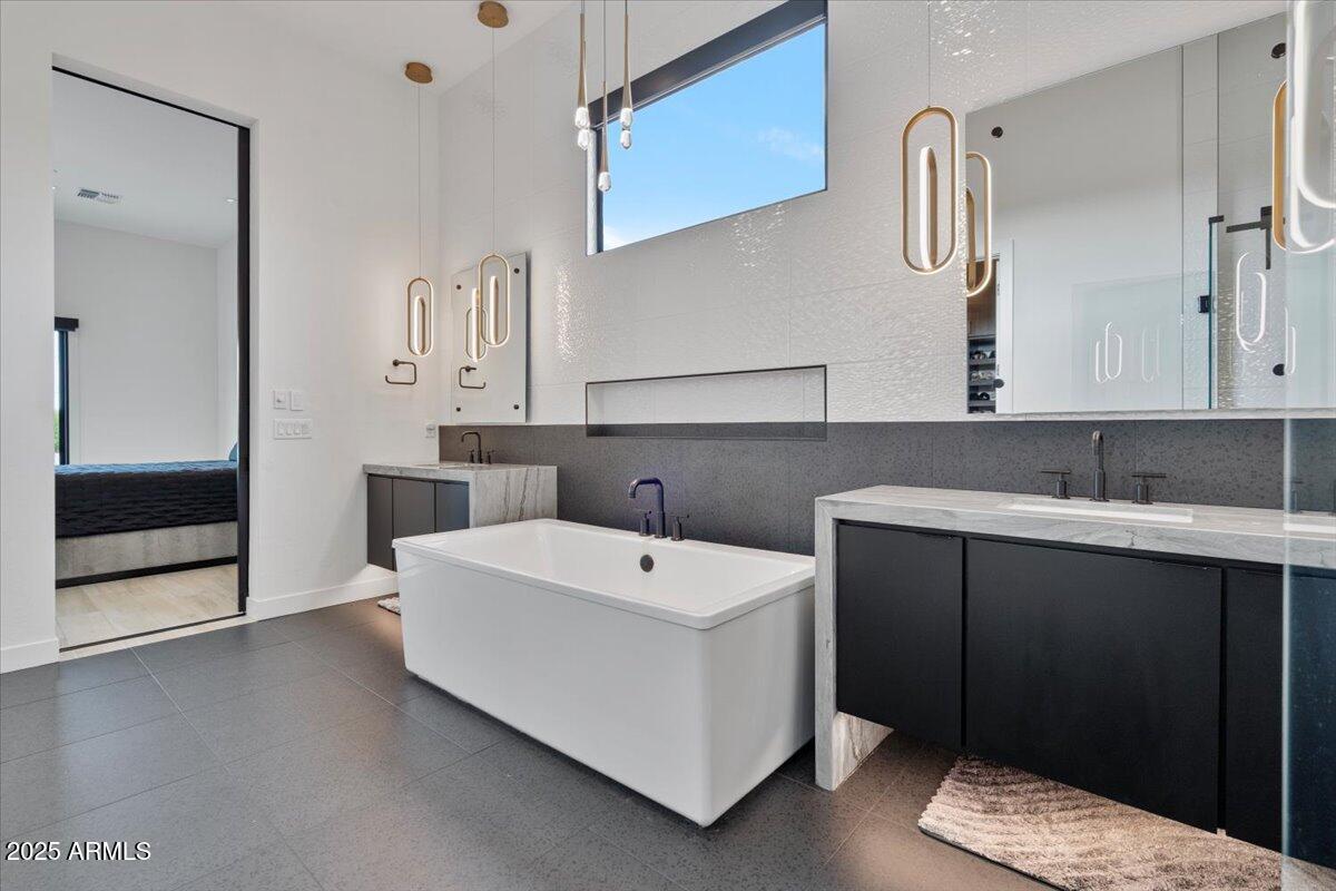 17237 East Desert Vista Trail Rio Verde, AZ 85263 - Photo 24 of 95 a bathroom with a sink and a mirror